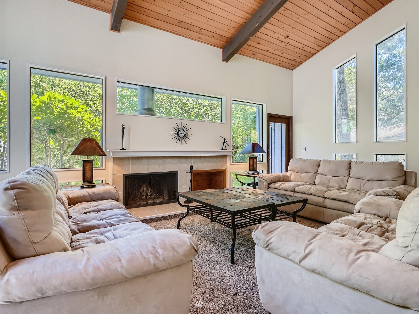 11521 Southeast 175th Street Renton, WA 98058 - Photo 16 of 20 a living room with furniture and a fireplace