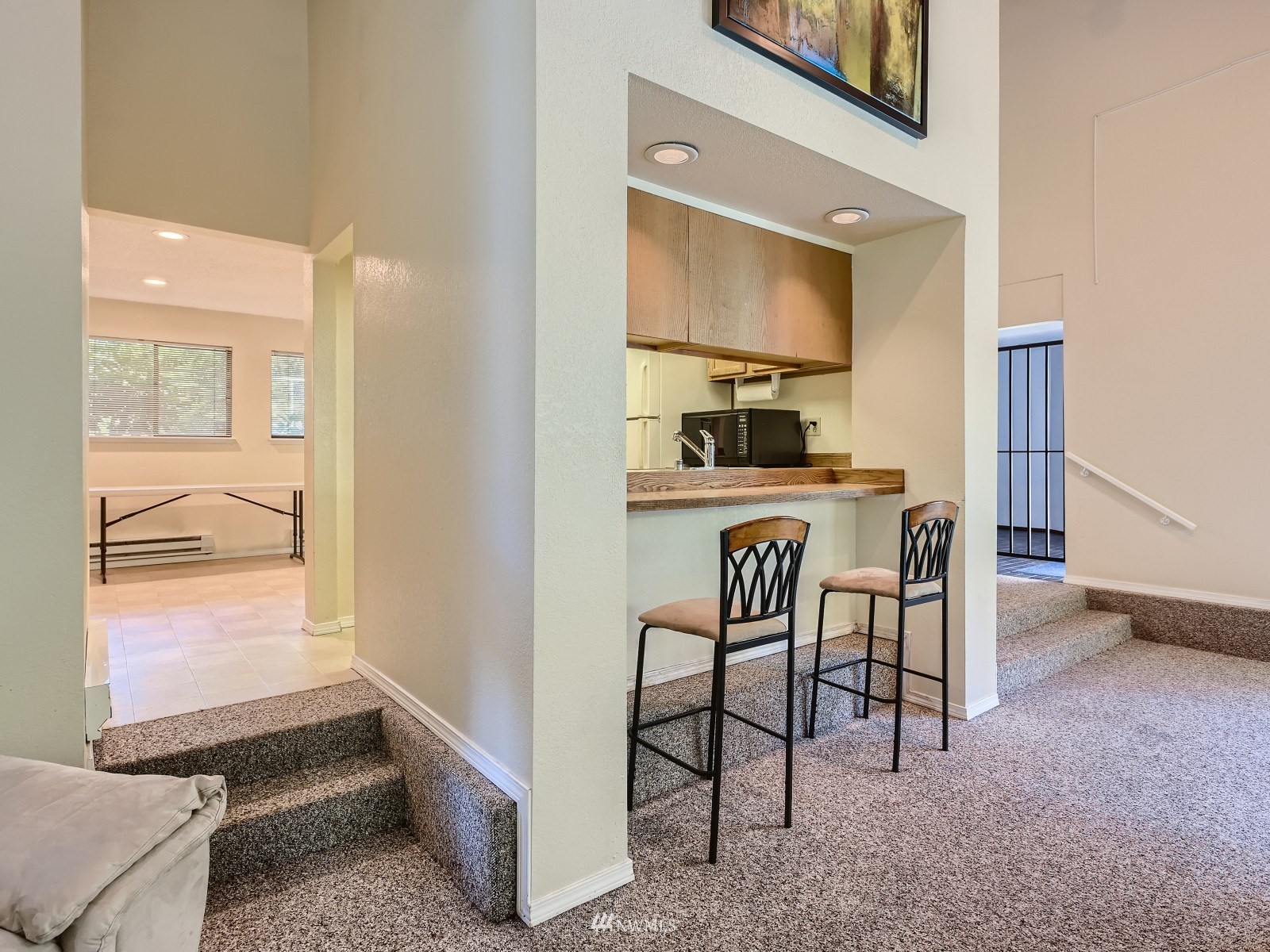 11521 Southeast 175th Street Renton, WA 98058 - Photo 17 of 20 a room with a table and chairs