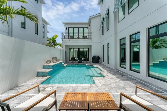 a view of an ocean and city