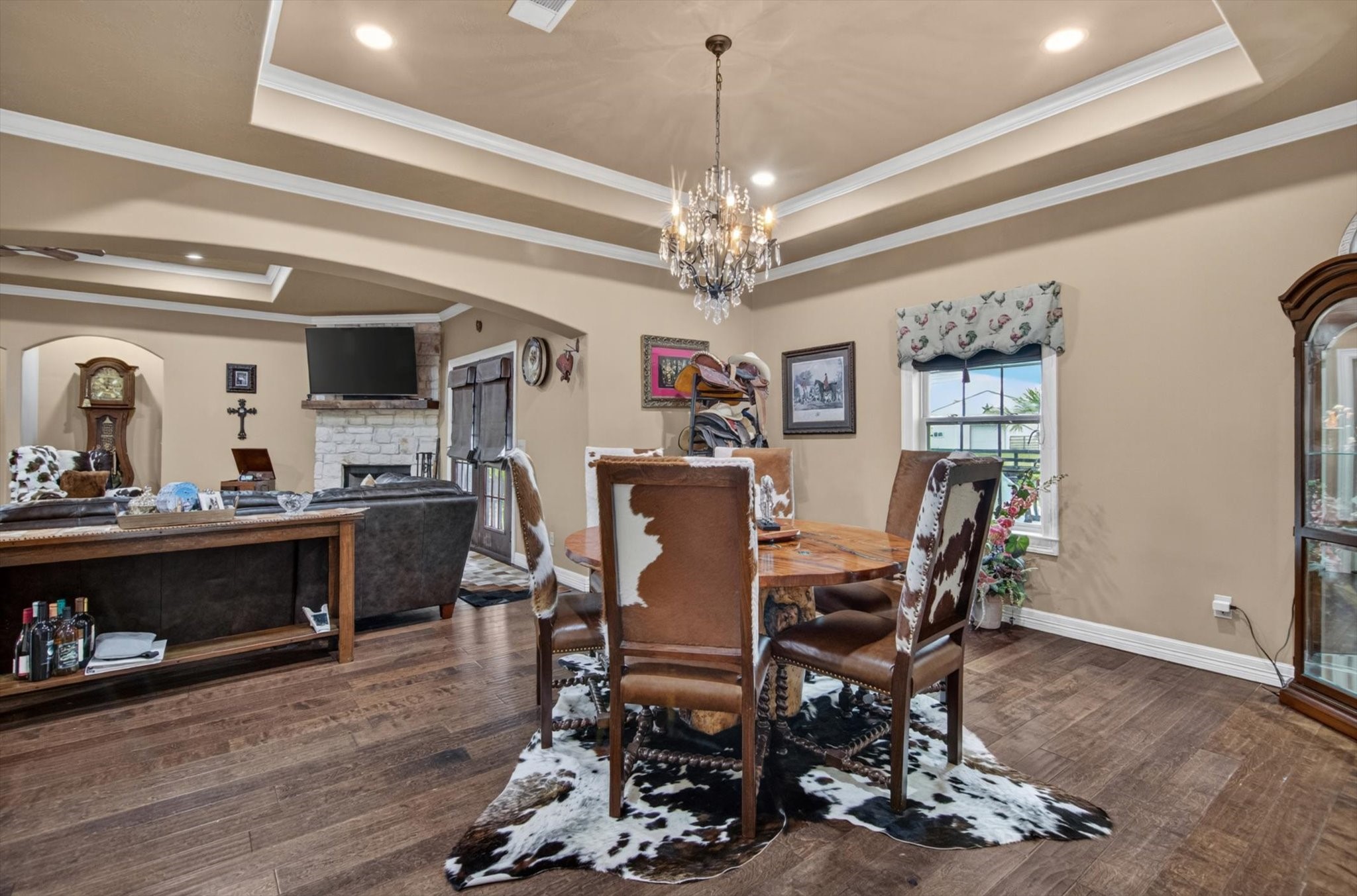 1755 McBride-Devillier Loop Winnie, TX 77665 - Photo 17 of 44 a view of a dining room with furniture and wooden floor
