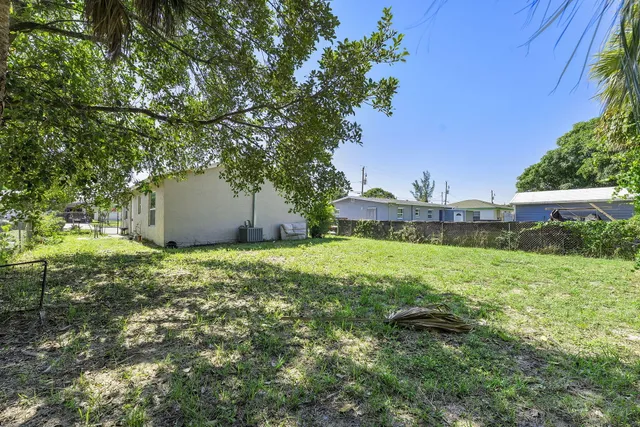 a fire hydrant in the middle of a field
