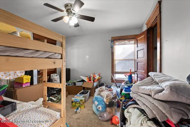 a room with furniture and stairs