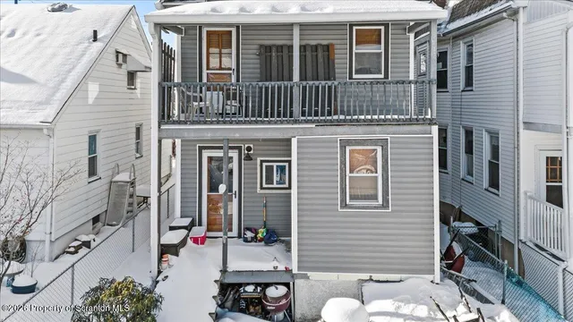 a front view of a house with balcony