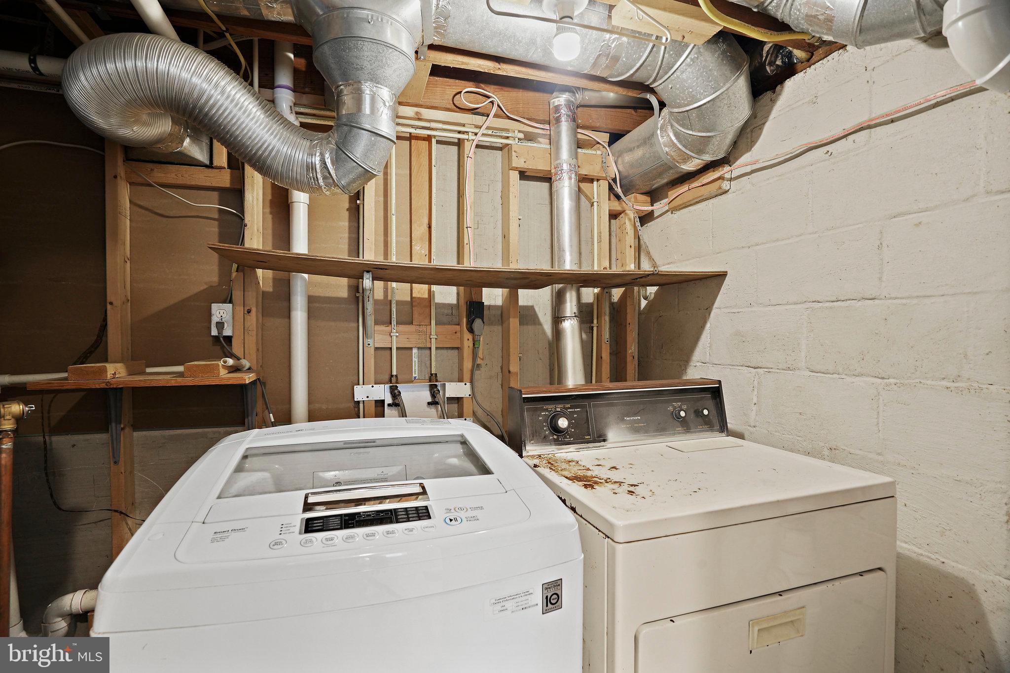12331 Charles Road Silver Spring, MD 20906 - Photo 22 of 26 Basement Laundry And Utility Area