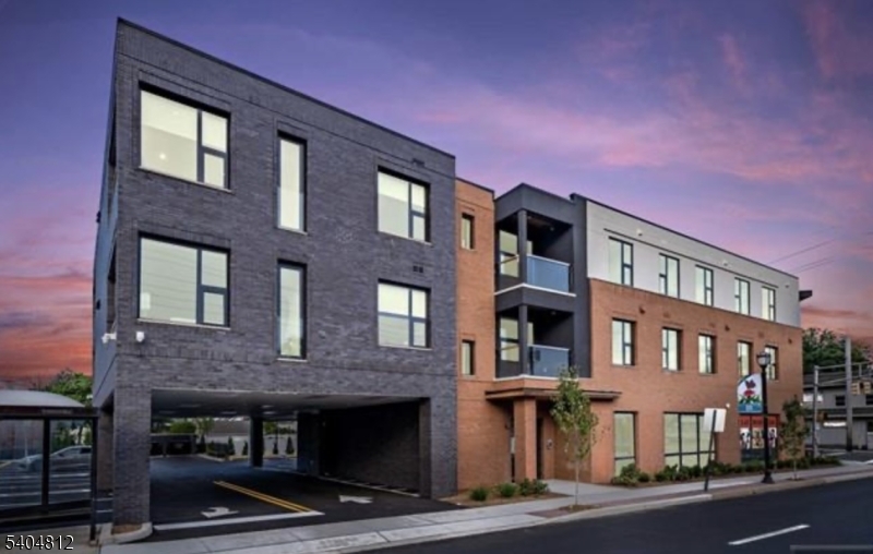 a front view of building with a street
