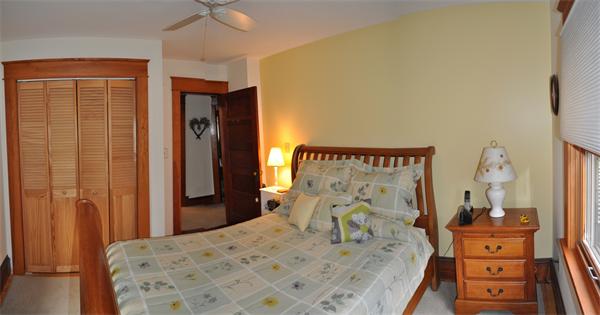 44 Silver Street Greenfield, MA 01301 - Photo 19 of 25 a bedroom with a bed and a dresser