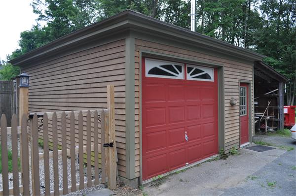 44 Silver Street Greenfield, MA 01301 - Photo 4 of 25 a front view of a house with a garage