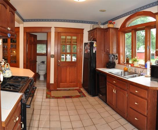 44 Silver Street Greenfield, MA 01301 - Photo 7 of 25 a kitchen with a sink cabinets and appliances