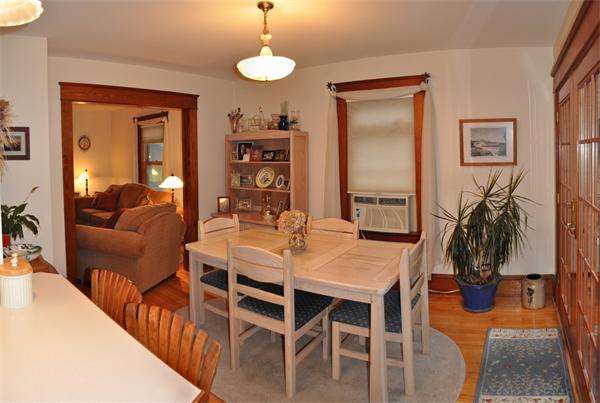 44 Silver Street Greenfield, MA 01301 - Photo 10 of 25 a view of a dining room with furniture window and wooden floor