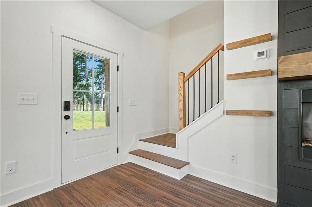 125 Old Alabama Road Southeast Emerson, GA 30137 - Photo 19 of 37 a view of an entryway with wooden floor and windows