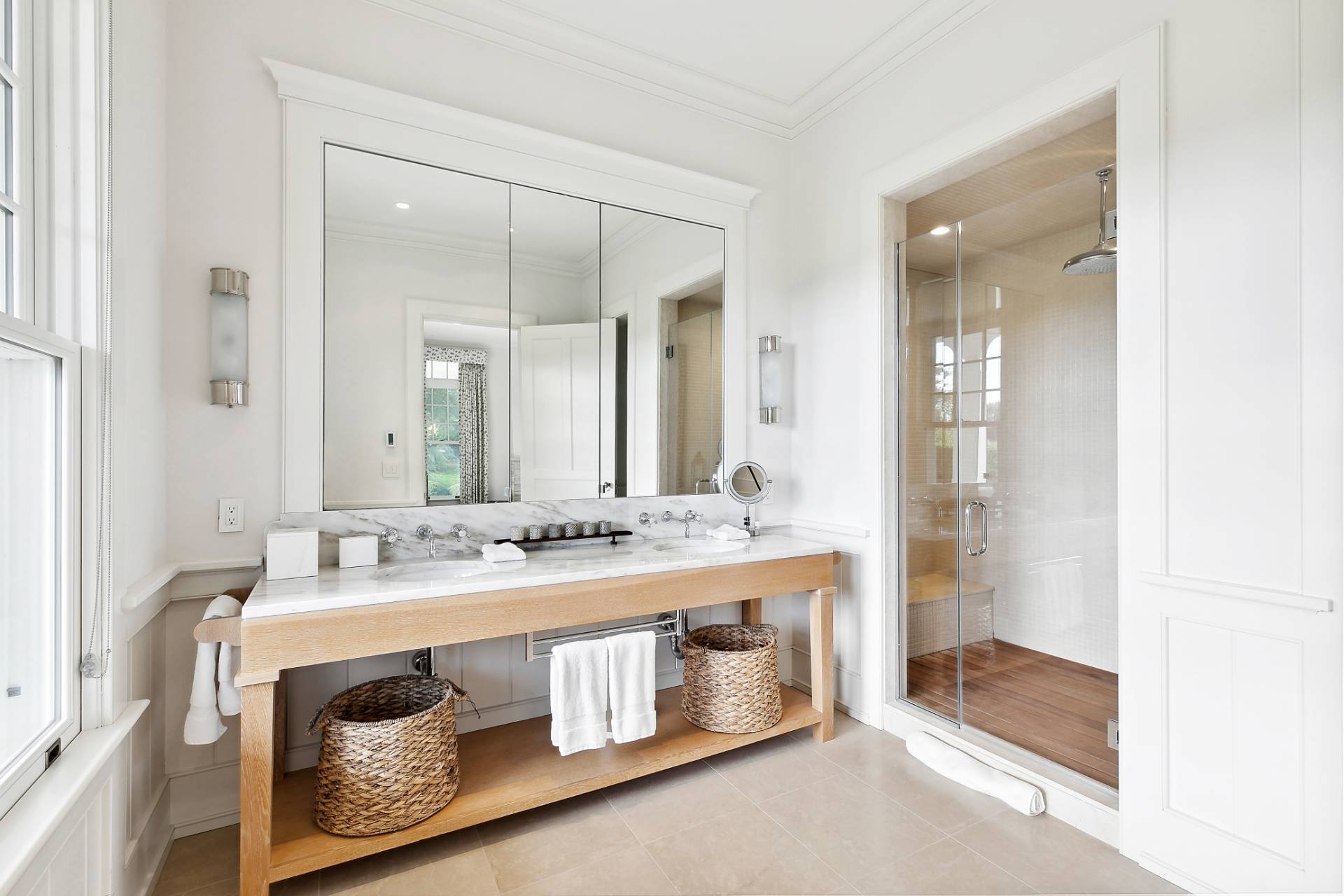 461 Ocean Road Bridgehampton, NY 11932 - Photo 11 of 29 a bathroom with a sink and a mirror
