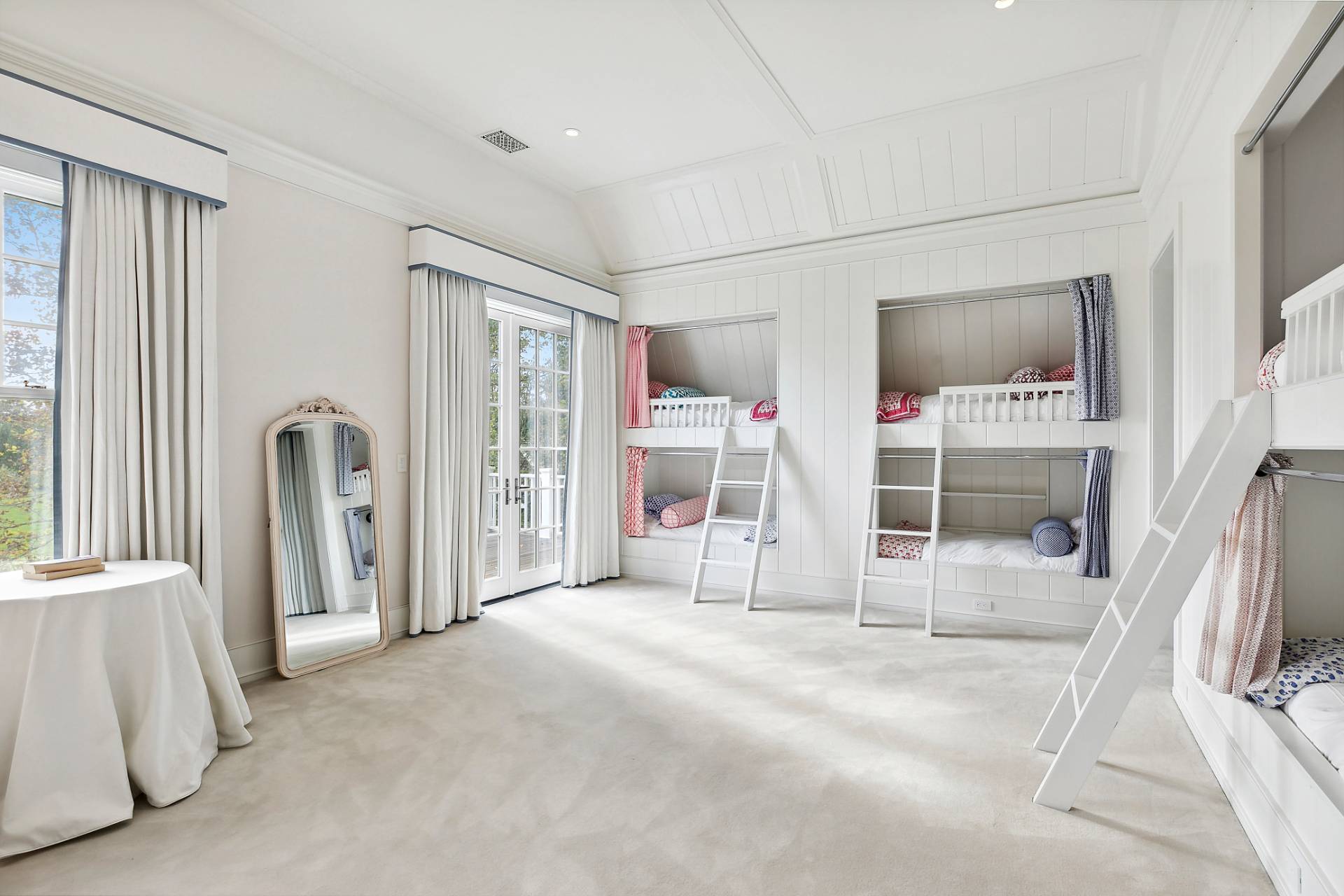 461 Ocean Road Bridgehampton, NY 11932 - Photo 14 of 29 a view of an empty room with a fireplace and a window