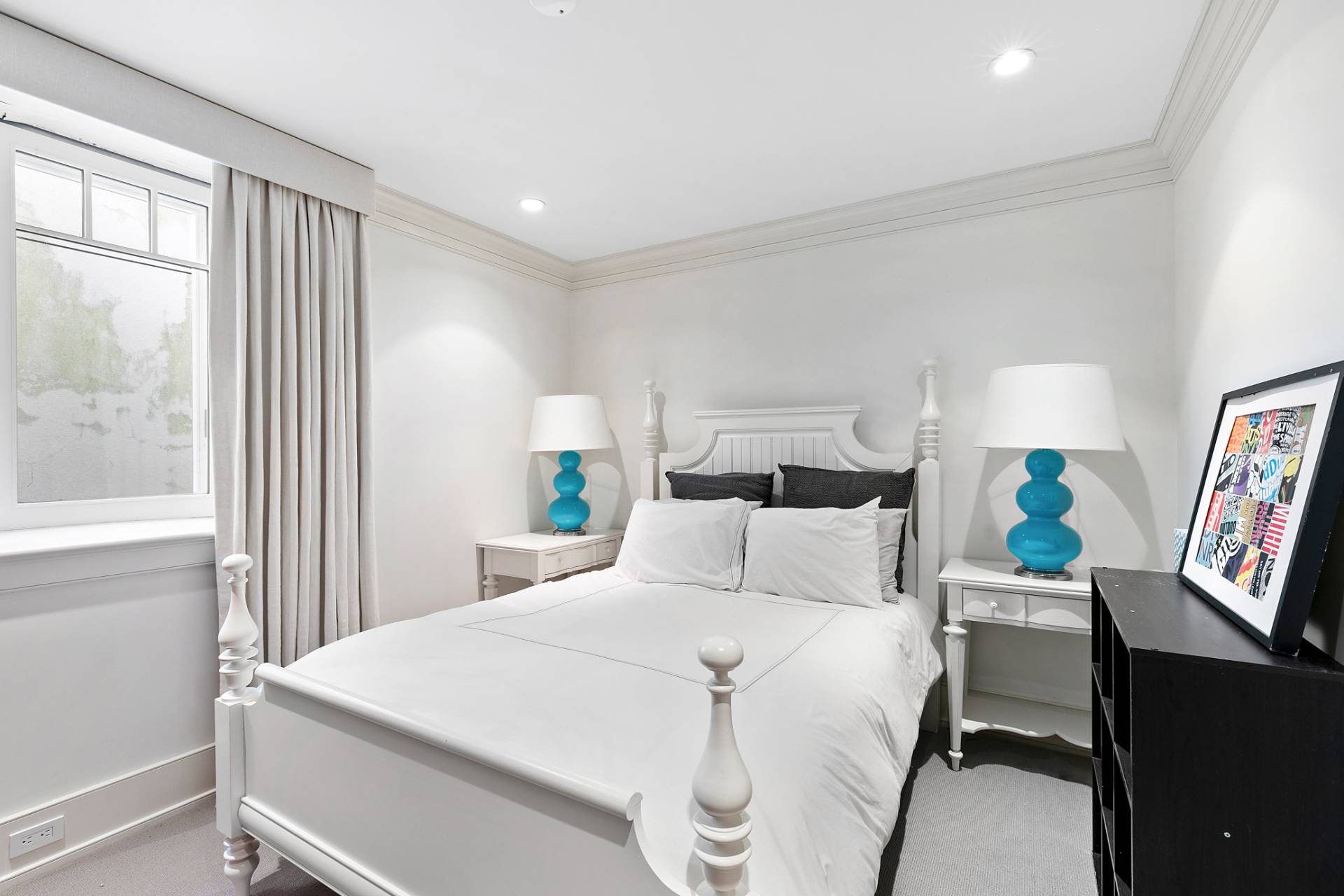 461 Ocean Road Bridgehampton, NY 11932 - Photo 21 of 29 a bedroom with a bed and a window