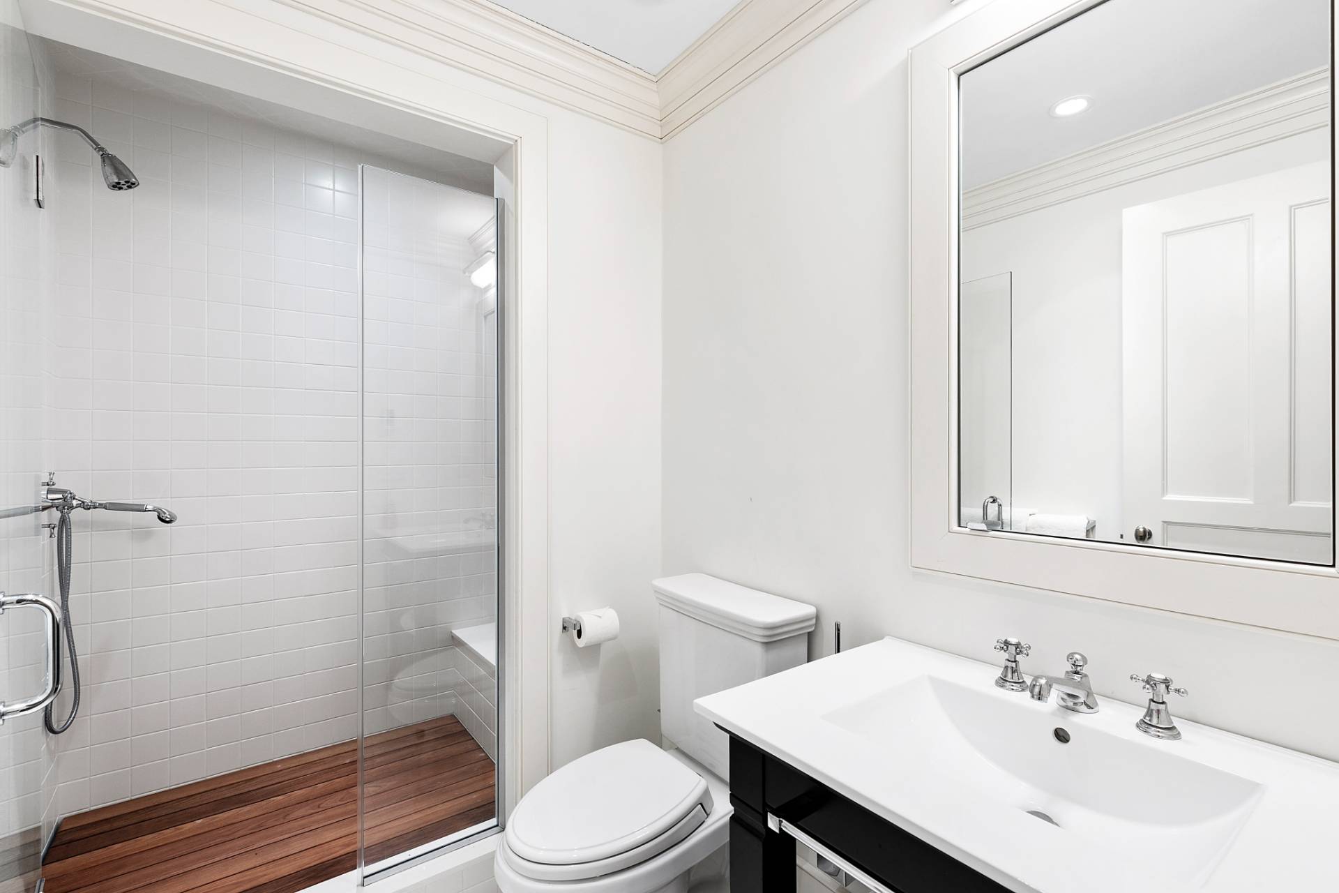 461 Ocean Road Bridgehampton, NY 11932 - Photo 22 of 29 a bathroom with a sink a toilet and shower