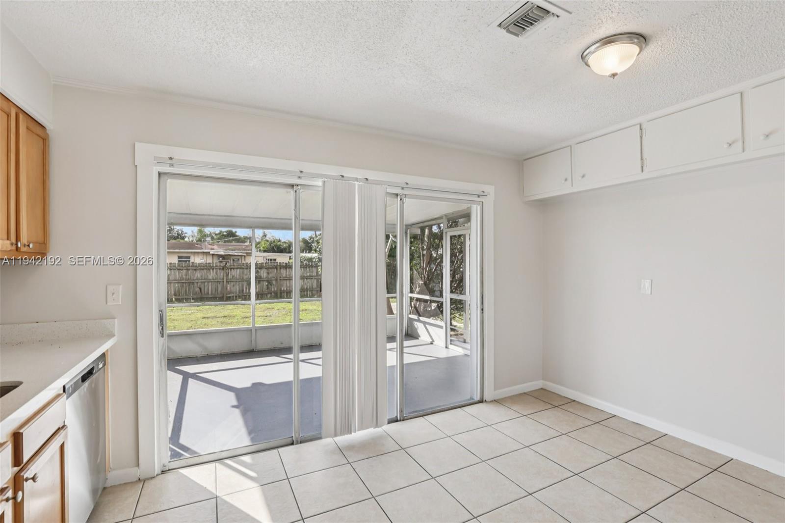 3209 Scanlan Avenue Lake Worth, FL 33461 - Photo 16 of 41 a bathroom with a tub sink and mirror