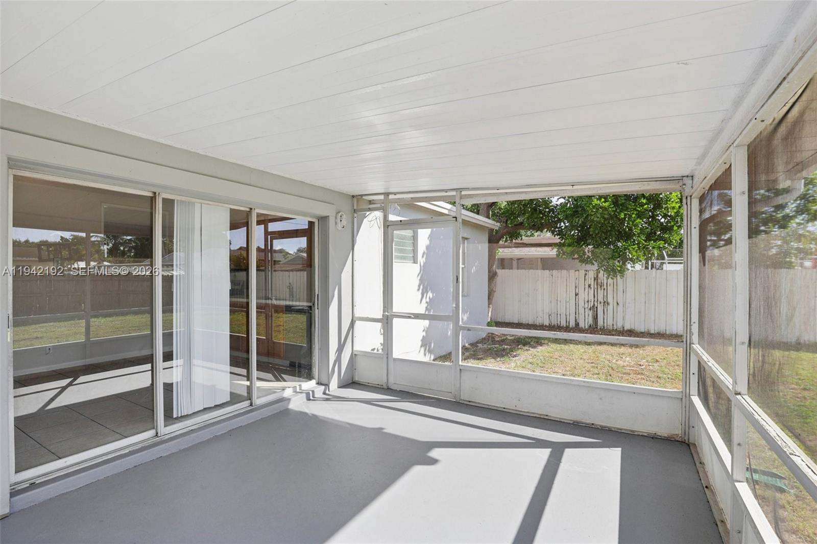 3209 Scanlan Avenue Lake Worth, FL 33461 - Photo 36 of 41 a spacious bathroom with a tub and shower