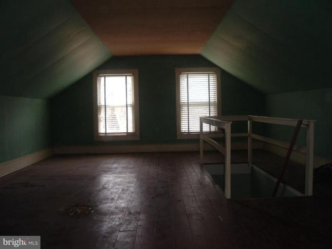 416 Front Street Crumpton, MD 21628 - Photo 16 of 16 UPSTAIRS OPEN ROOM WITH WOOD FLOORS