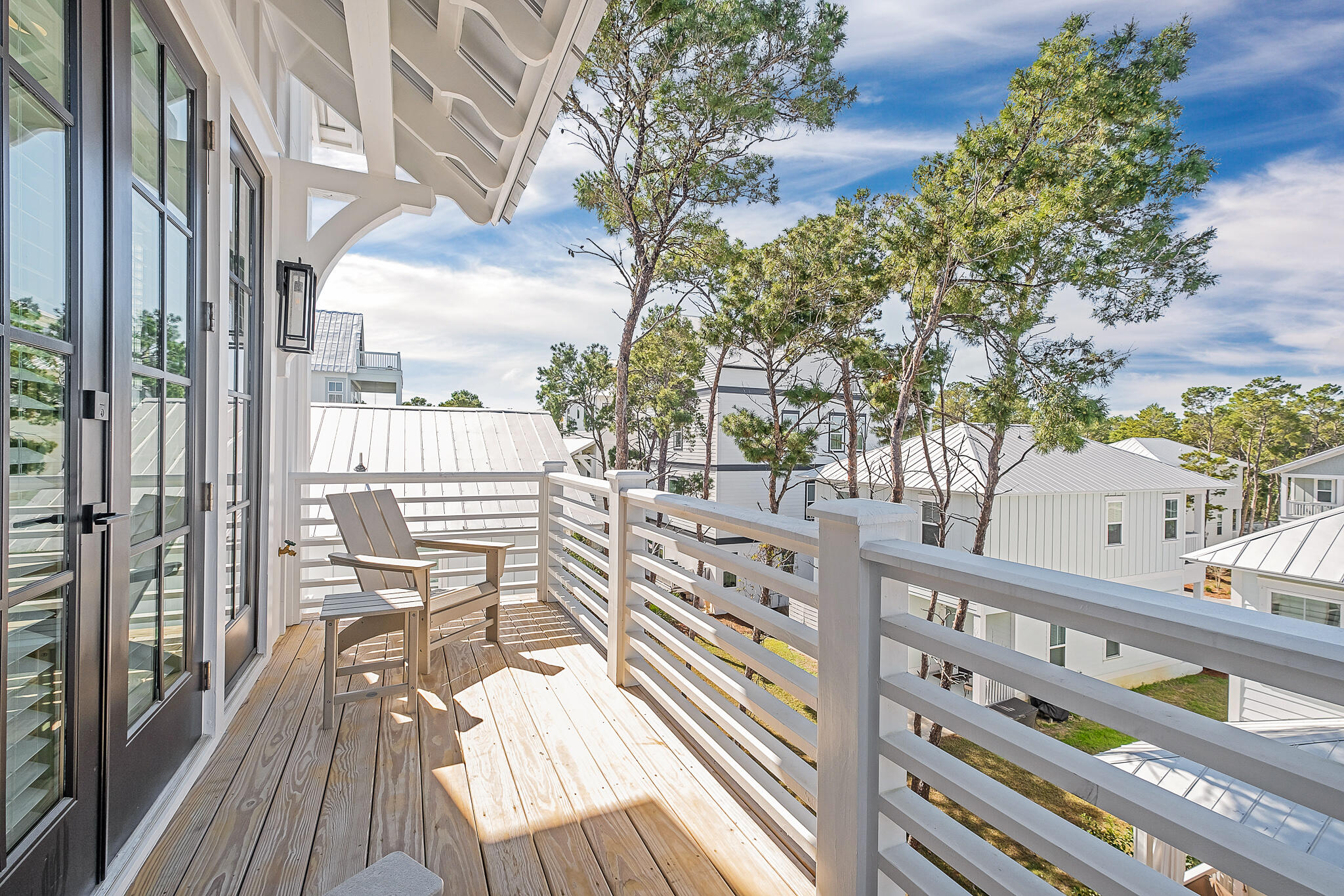 107 Grande Pointe Dr Inlet Beach Inlet Beach, FL 32461 - Photo 20 of 78 a view of a balcony with wooden floor
