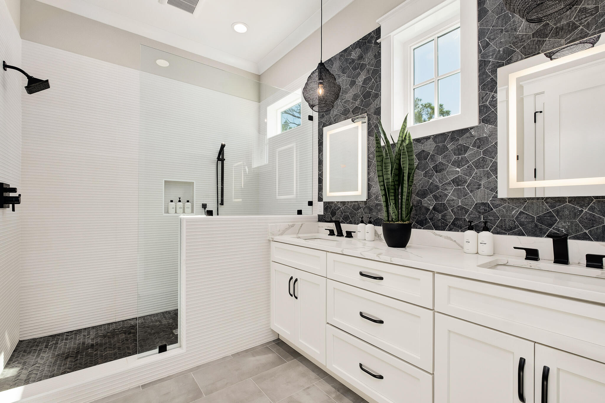 107 Grande Pointe Dr Inlet Beach Inlet Beach, FL 32461 - Photo 26 of 78 a bathroom with a double vanity sink mirror and