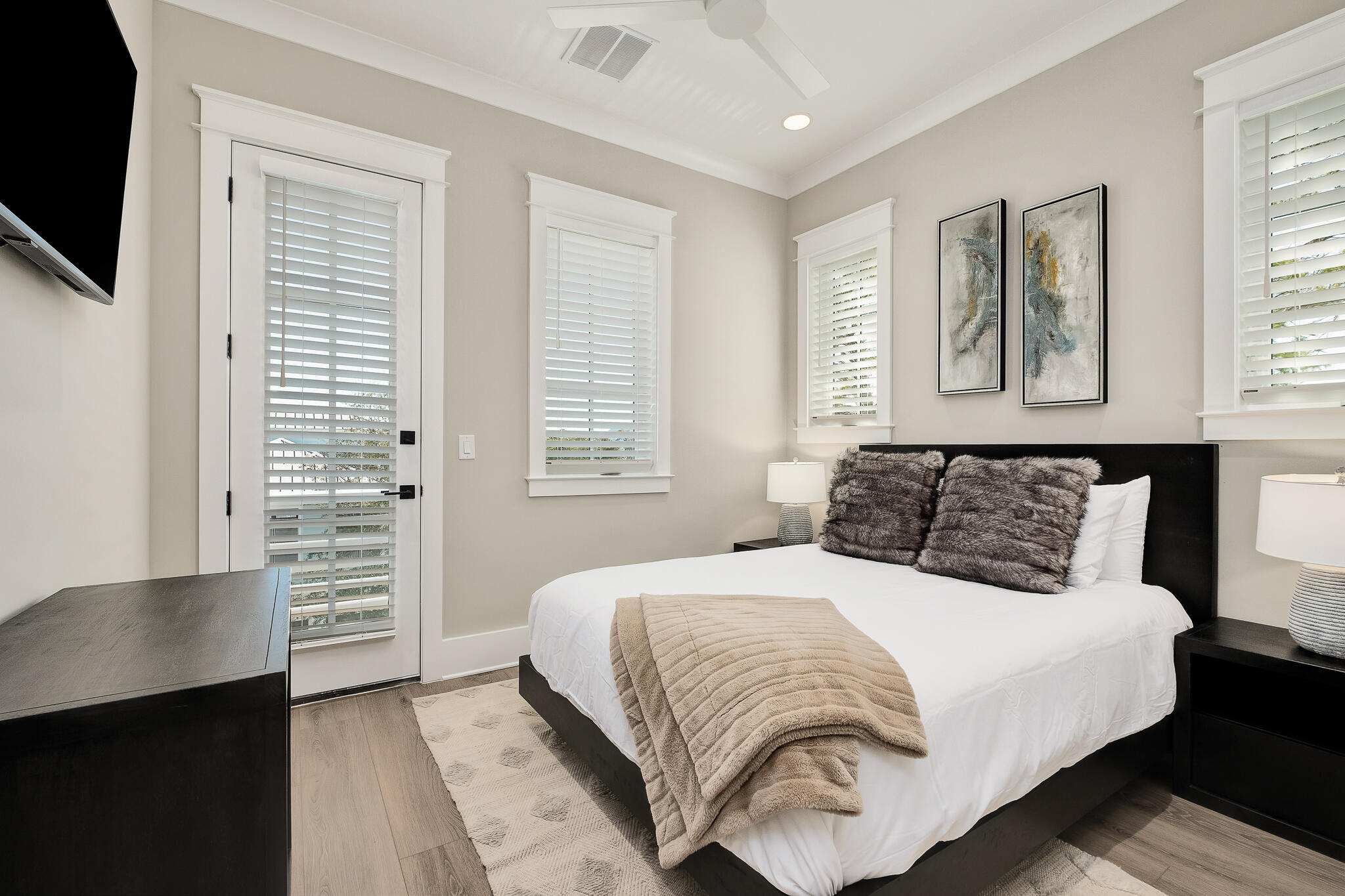 107 Grande Pointe Dr Inlet Beach Inlet Beach, FL 32461 - Photo 39 of 78 a bedroom with a large bed and a tv