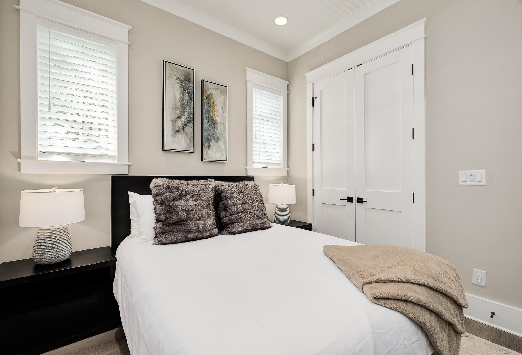 107 Grande Pointe Dr Inlet Beach Inlet Beach, FL 32461 - Photo 40 of 78 a bedroom with a large bed and a lamp on dresser