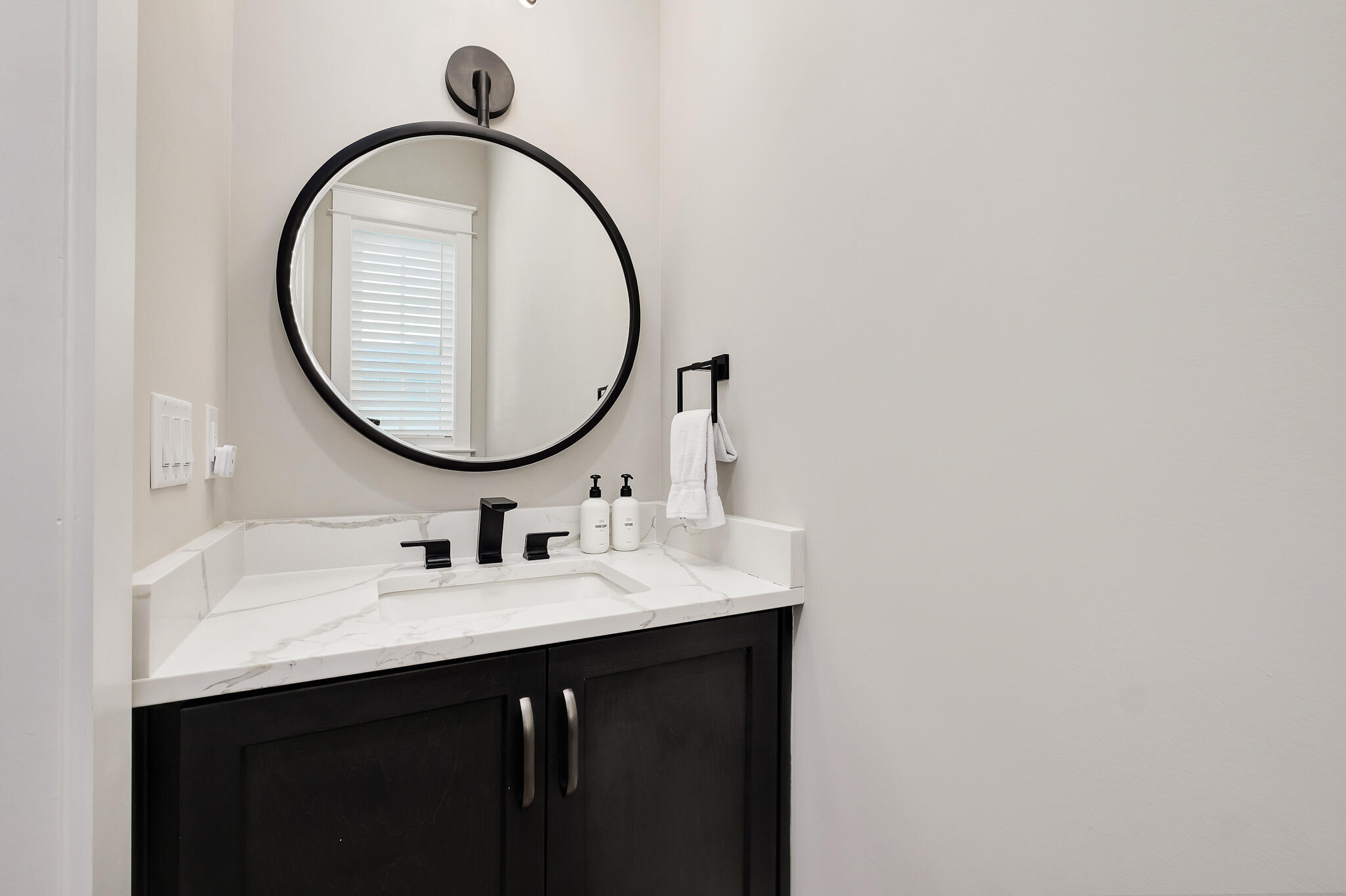 107 Grande Pointe Dr Inlet Beach Inlet Beach, FL 32461 - Photo 43 of 78 a bathroom with a sink and a mirror