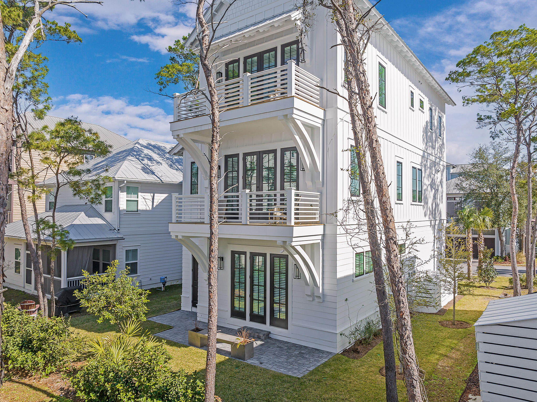 107 Grande Pointe Dr Inlet Beach Inlet Beach, FL 32461 - Photo 48 of 78 front view of a house with a yard