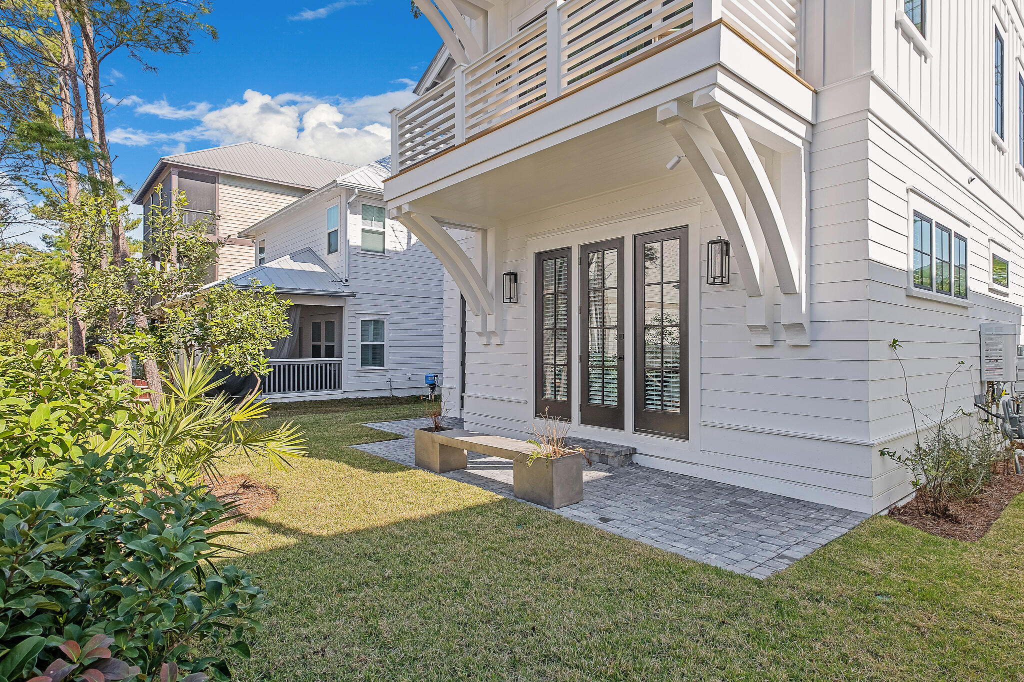 107 Grande Pointe Dr Inlet Beach Inlet Beach, FL 32461 - Photo 51 of 78 a front view of a house with garden