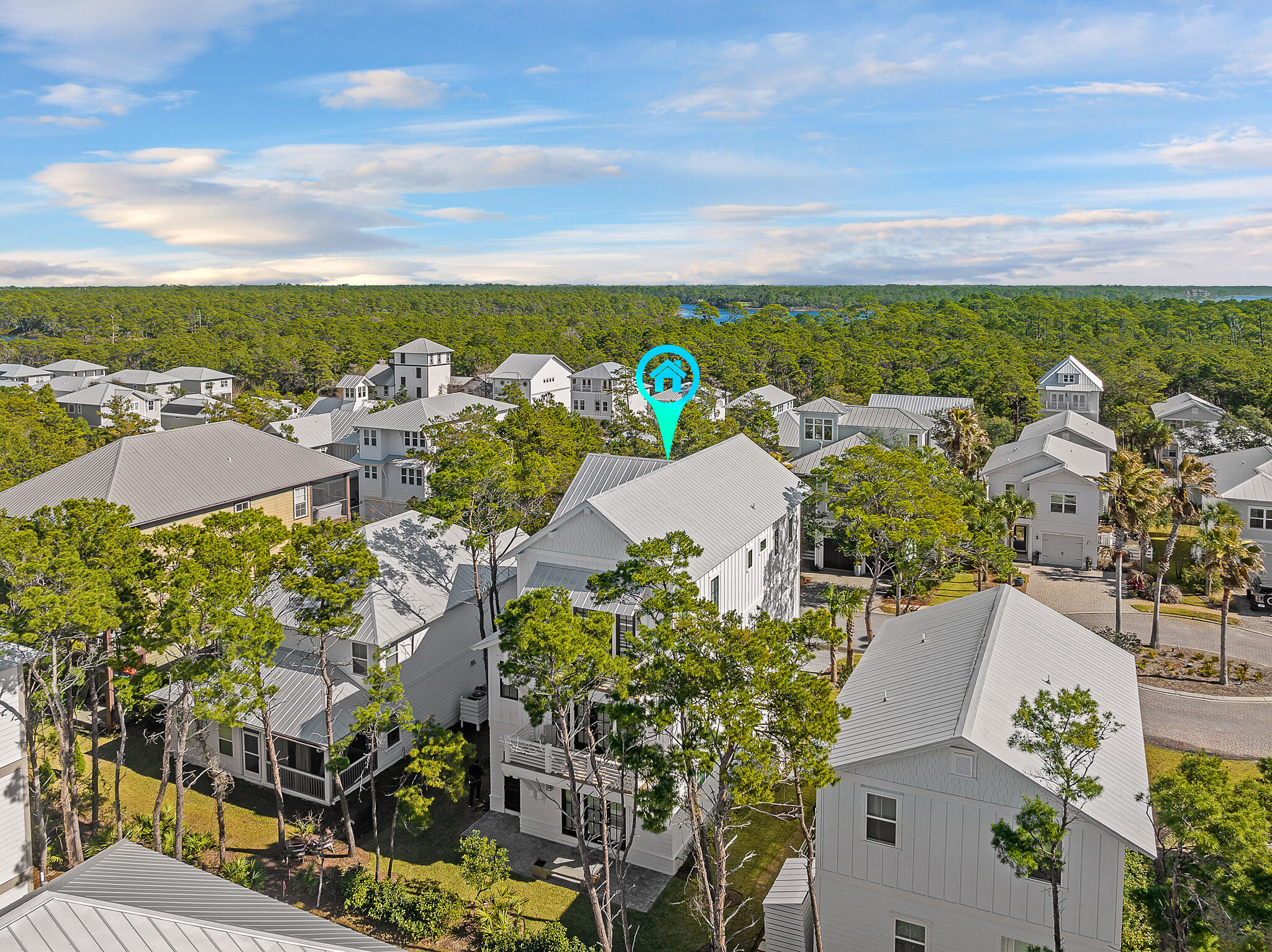 107 Grande Pointe Dr Inlet Beach Inlet Beach, FL 32461 - Photo 53 of 78 an aerial view of a city with lots of residential buildings ocean and mountain view in back