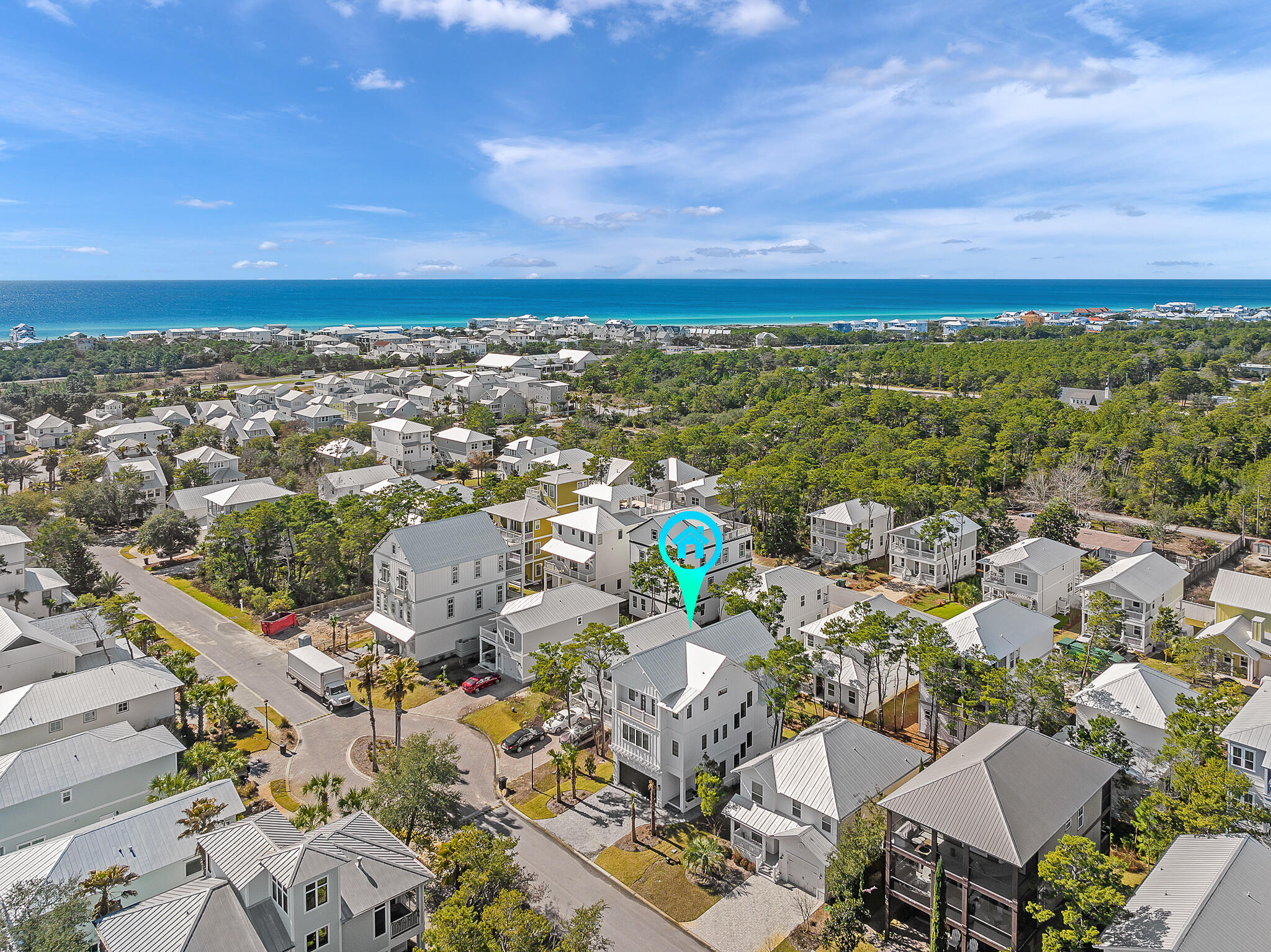 107 Grande Pointe Dr Inlet Beach Inlet Beach, FL 32461 - Photo 58 of 78 an aerial view of a city with lots of residential buildings and ocean view in back