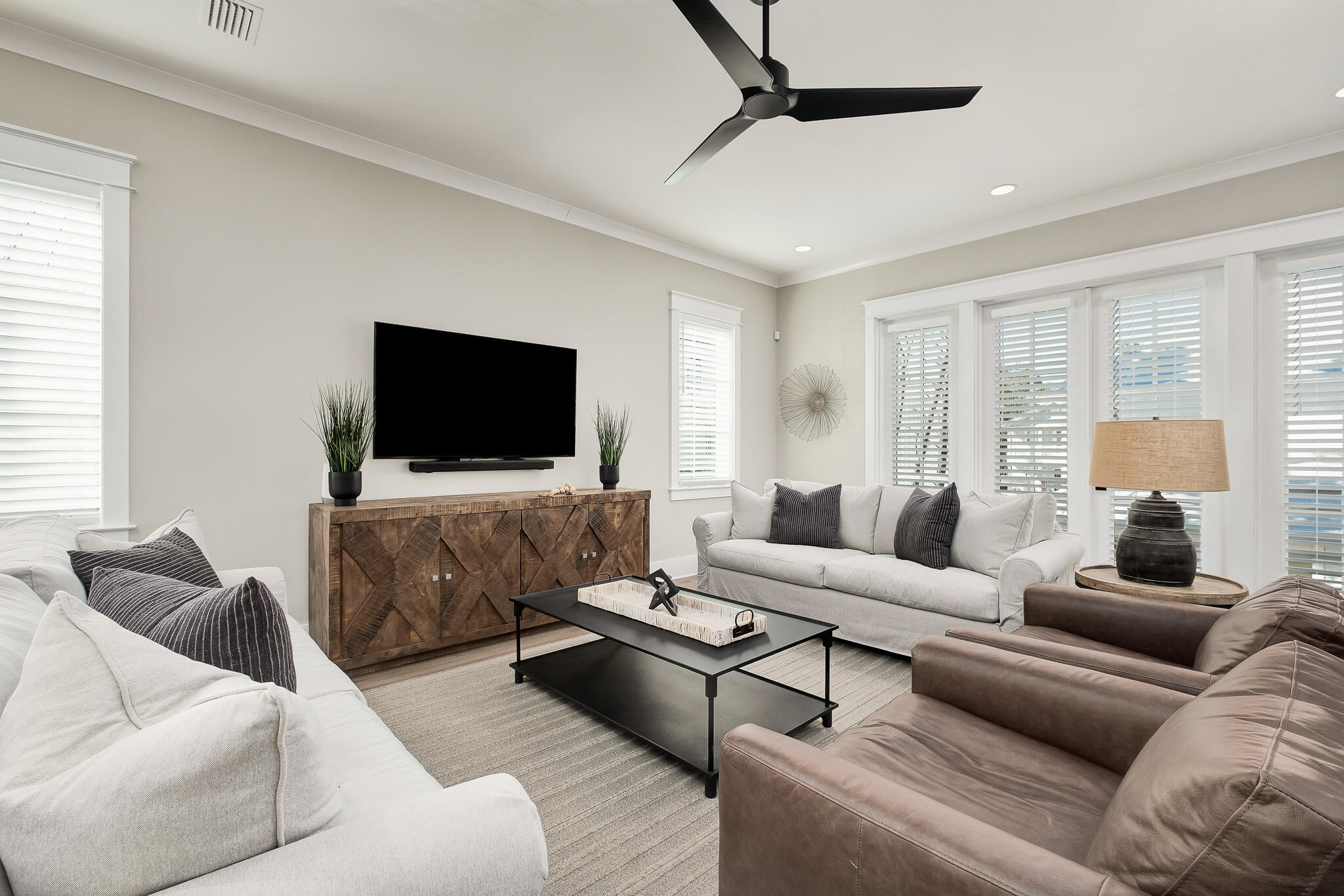 107 Grande Pointe Dr Inlet Beach Inlet Beach, FL 32461 - Photo 6 of 78 a living room with furniture and a flat screen tv
