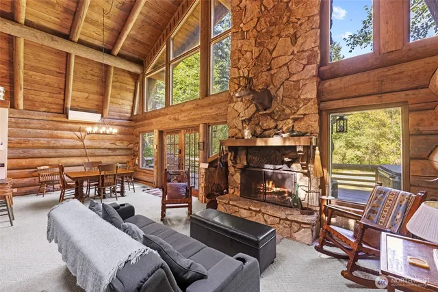 a view of a chairs and tables in the balcony