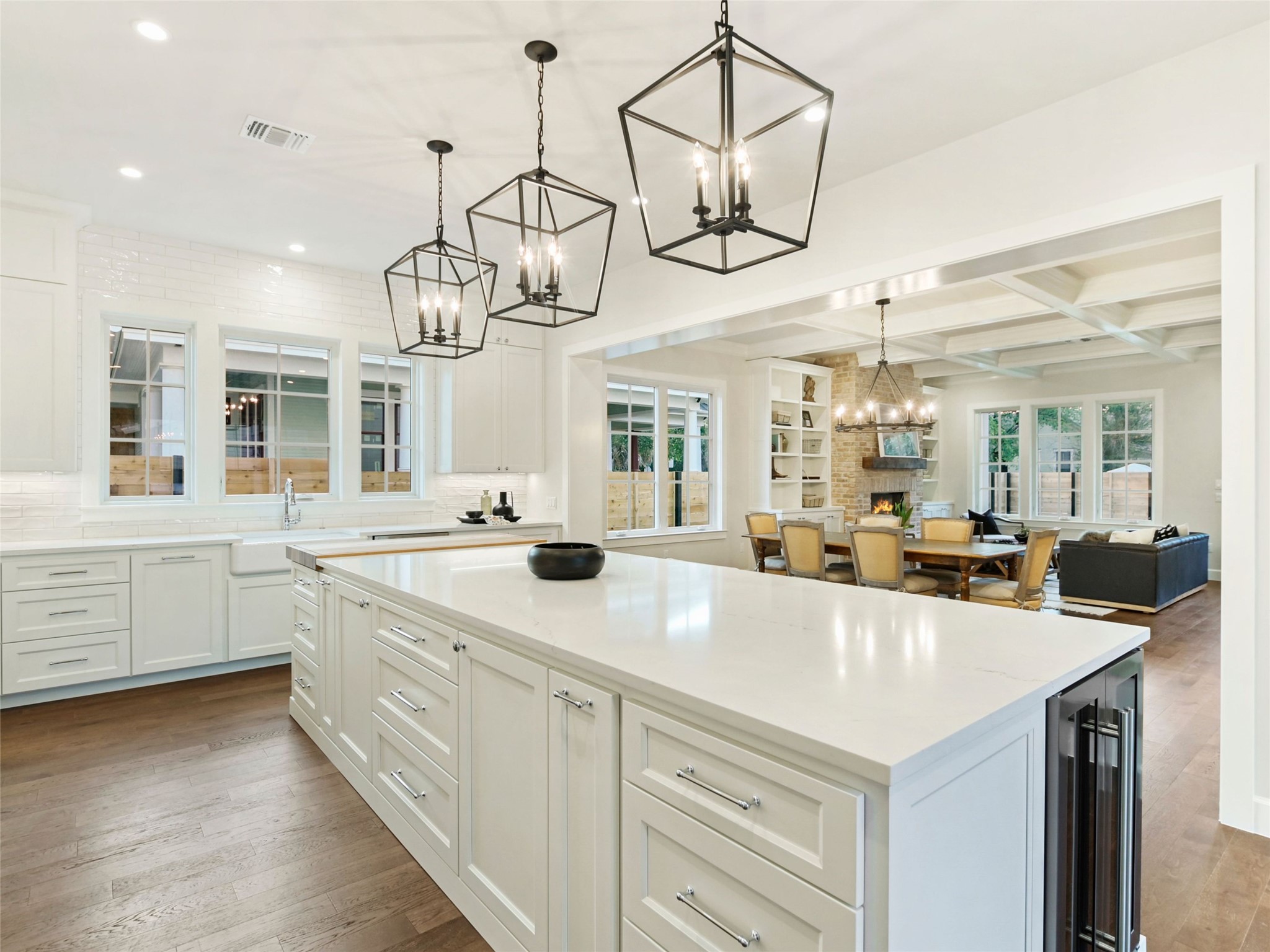 1603 Willow Street Austin, TX 78702 - Photo 30 of 30 a kitchen with stainless steel appliances a sink and chandelier