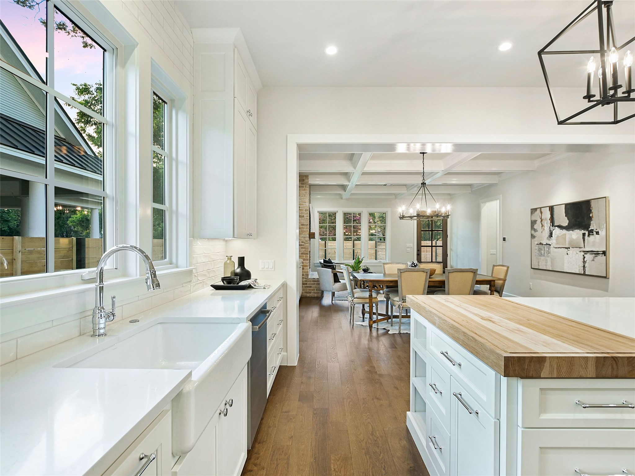1603 Willow Street Austin, TX 78702 - Photo 12 of 30 a kitchen with counter top space a sink and living room view