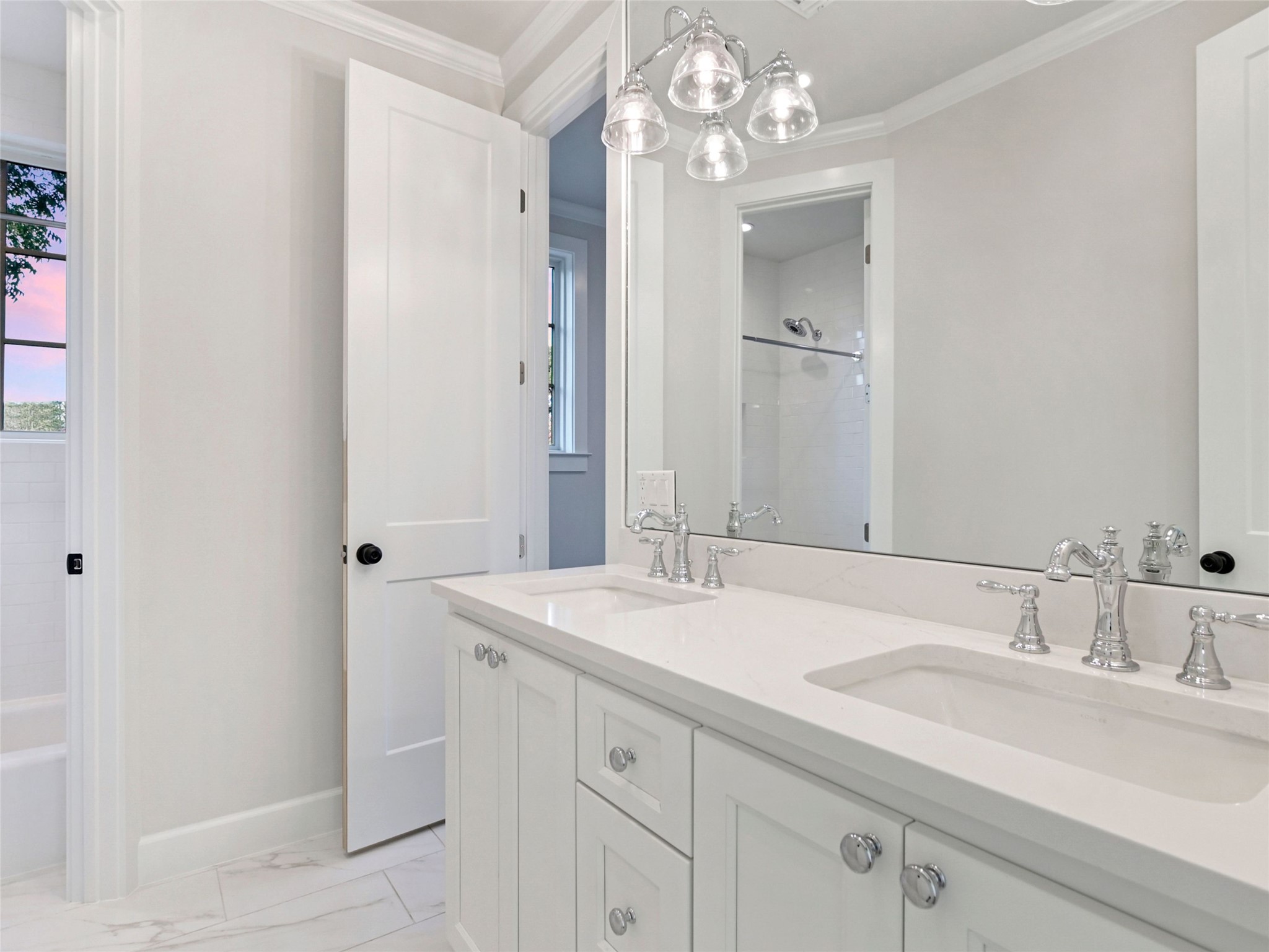 1603 Willow Street Austin, TX 78702 - Photo 19 of 30 a bathroom with a sink double vanity and a mirror