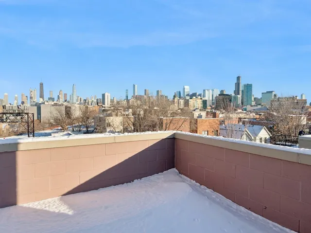 a view of a terrace with city view