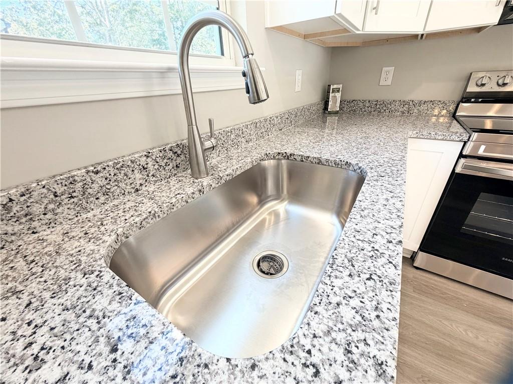 382 Arlington Lane Commerce, GA 30529 - Photo 12 of 43 a close view of sink