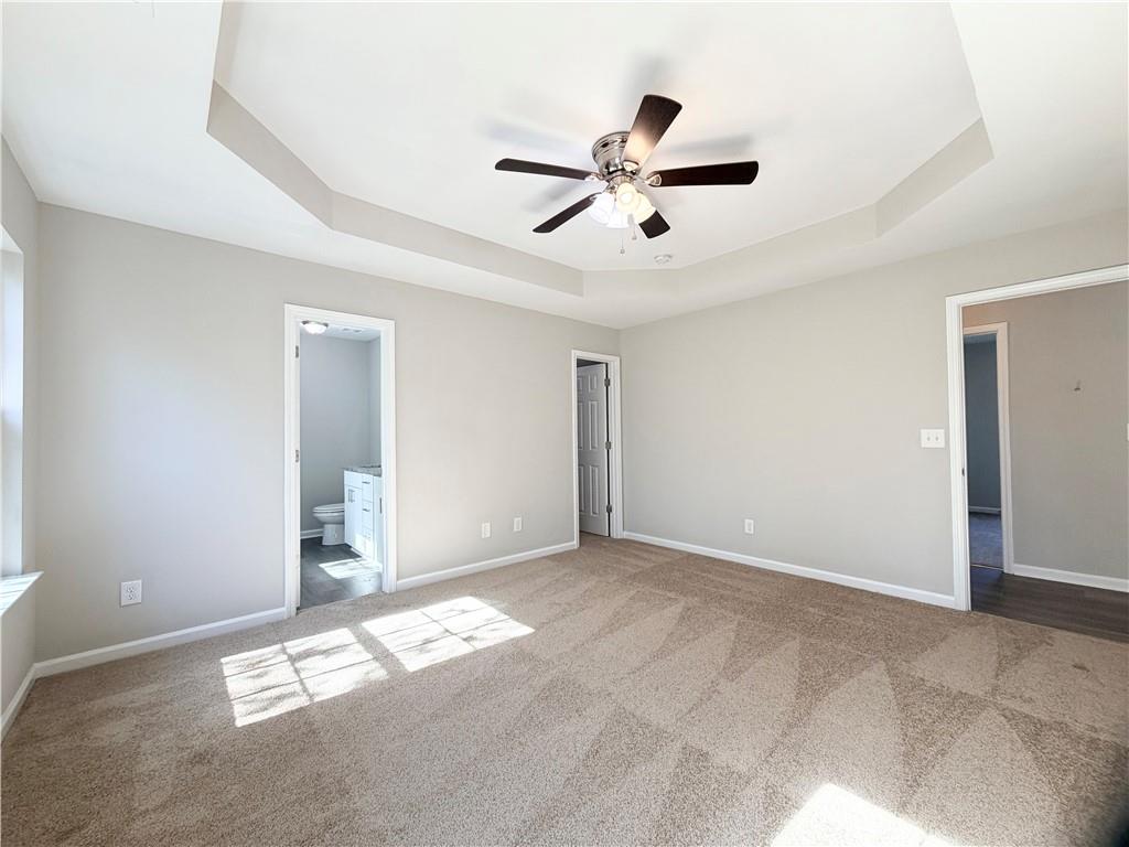 382 Arlington Lane Commerce, GA 30529 - Photo 18 of 43 a view of a livingroom with a ceiling fan and window
