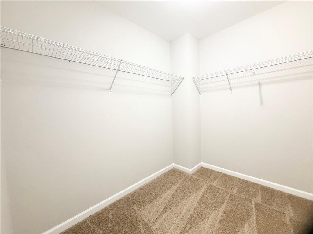 382 Arlington Lane Commerce, GA 30529 - Photo 20 of 43 a view of a room with racks on the wall
