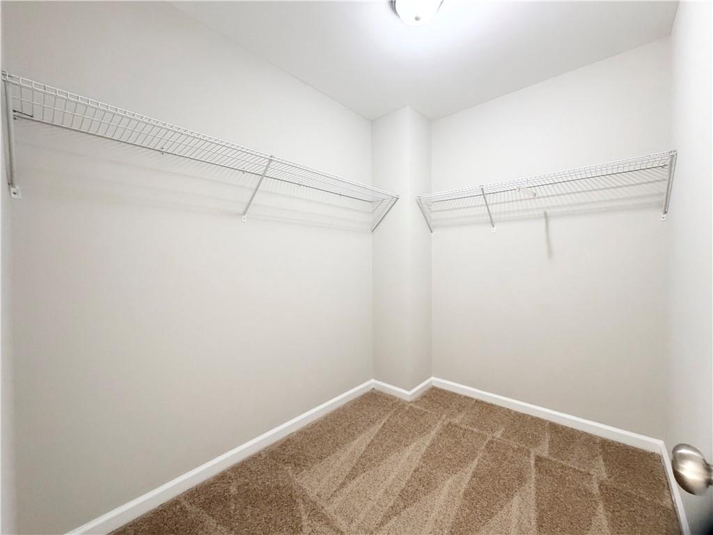 382 Arlington Lane Commerce, GA 30529 - Photo 21 of 43 a view of a room with racks on the wall