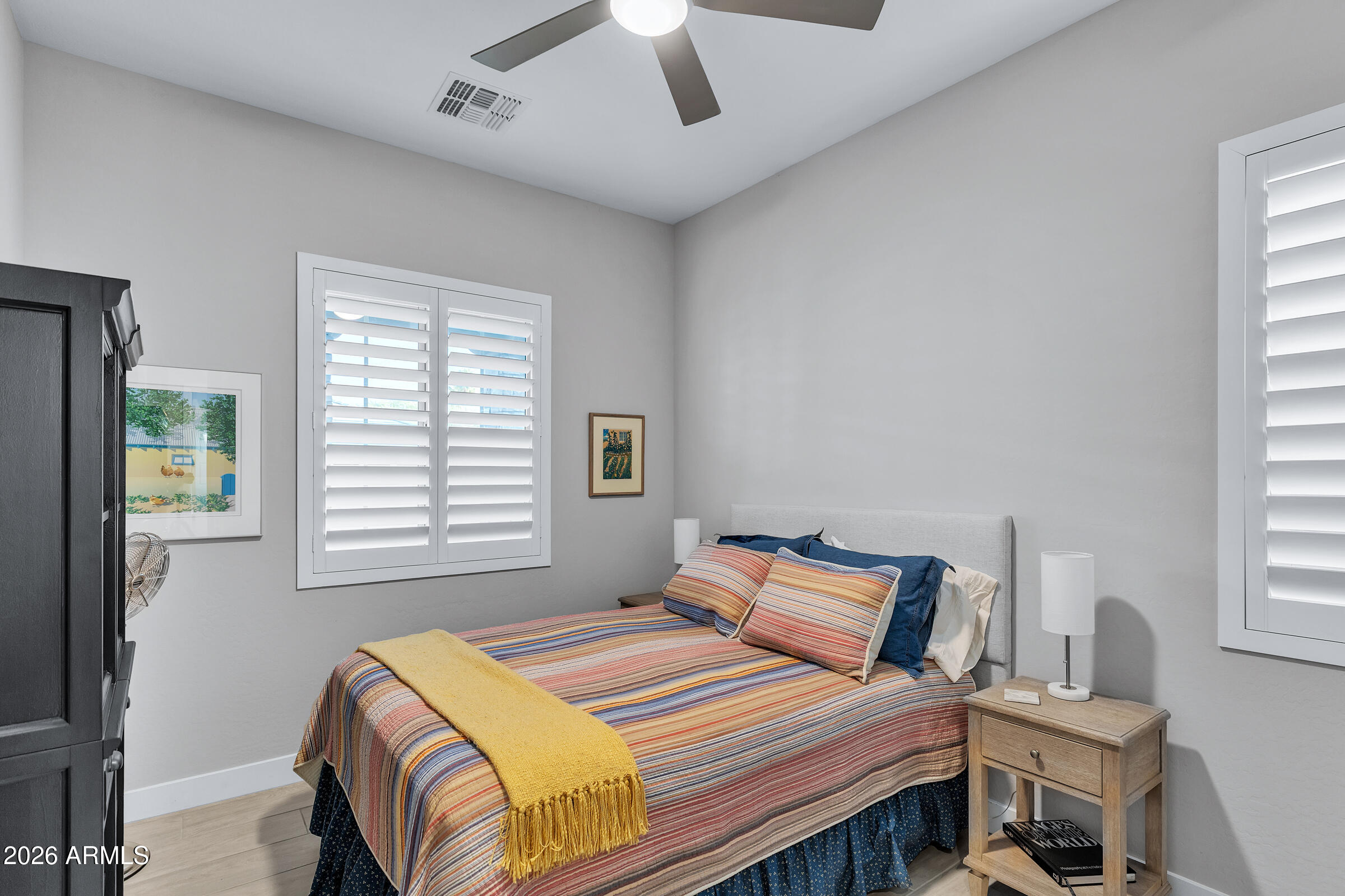 622 West Deer Creek Road Phoenix, AZ 85048 - Photo 17 of 39 a bedroom with a bed and a window