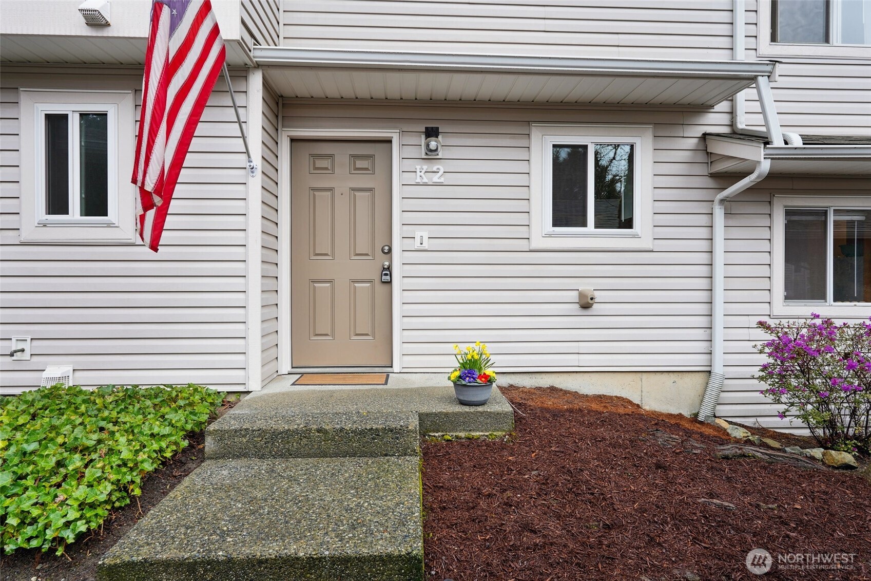 a view of a house with a small porch