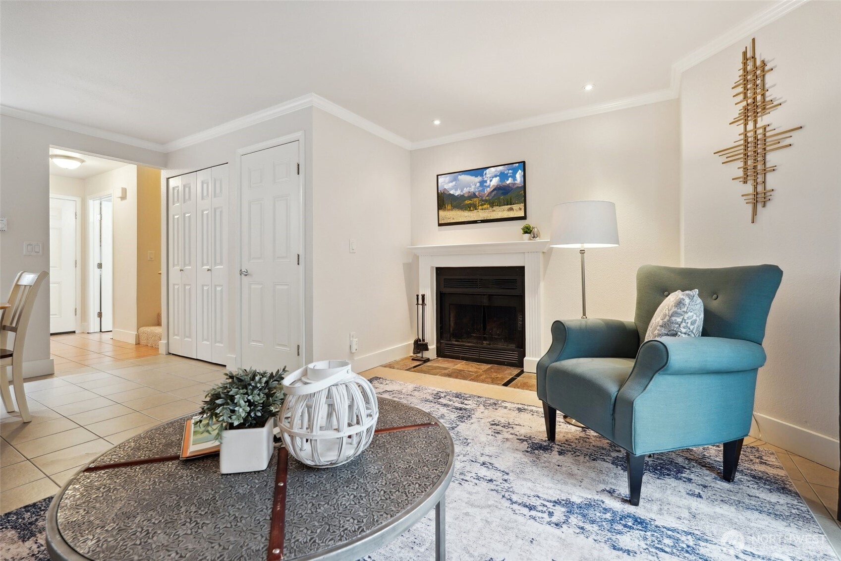 18910 Bothell Everett Highway, Unit K2 Bothell, WA 98012 - Photo 13 of 34 a living room with furniture and a fireplace