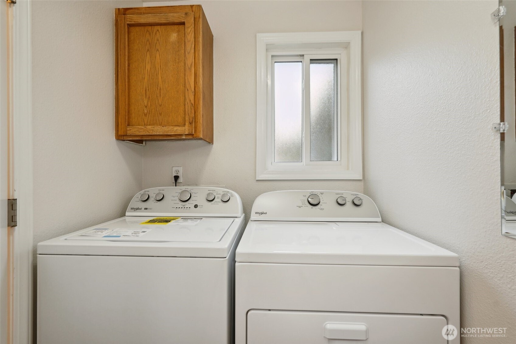 18910 Bothell Everett Highway, Unit K2 Bothell, WA 98012 - Photo 15 of 34 a utility room with dryer and washer