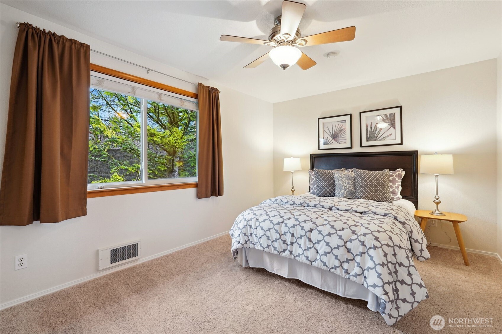 18910 Bothell Everett Highway, Unit K2 Bothell, WA 98012 - Photo 16 of 34 a bedroom with a large bed and a window