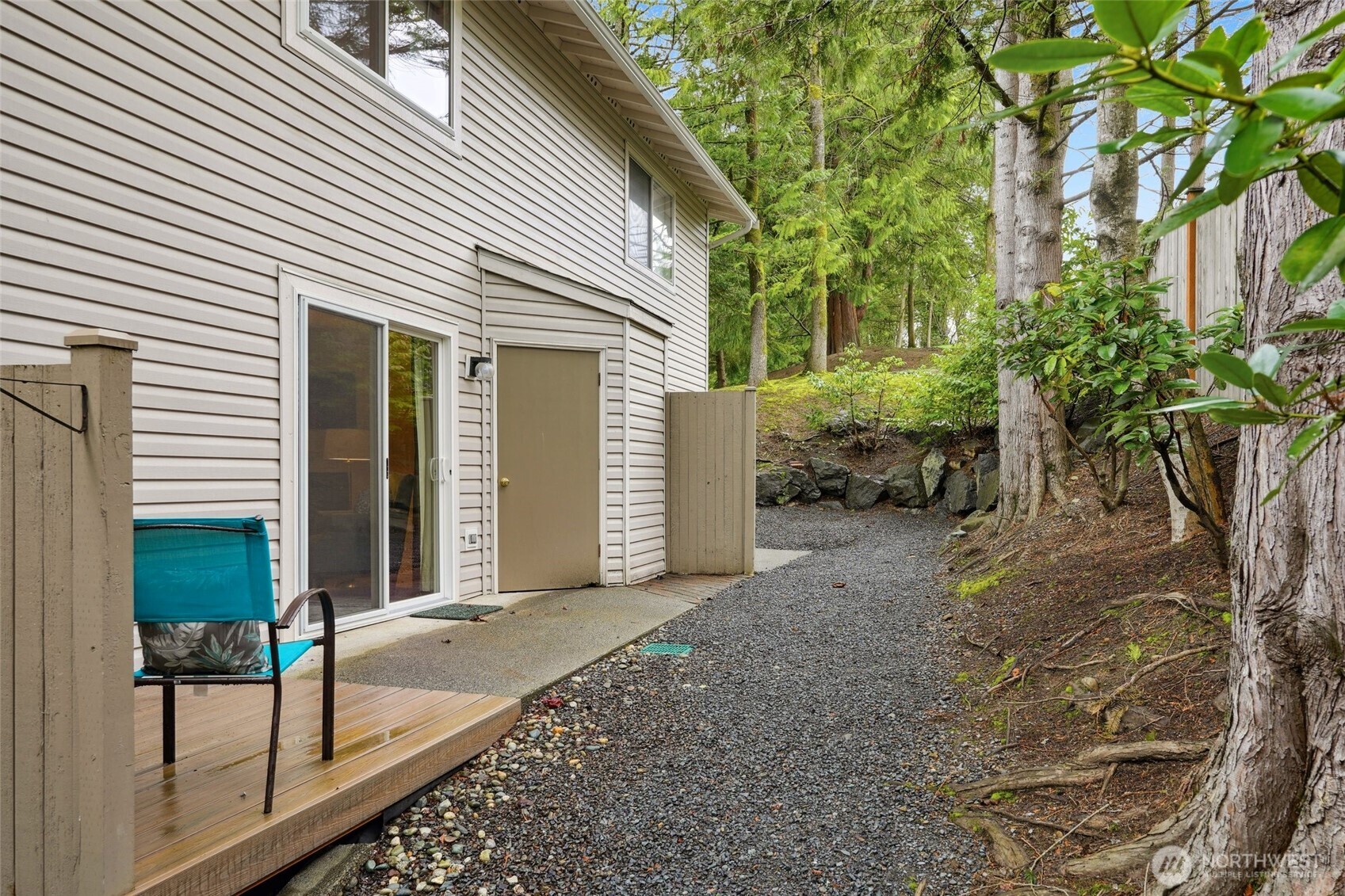 18910 Bothell Everett Highway, Unit K2 Bothell, WA 98012 - Photo 23 of 34 a view of a house with backyard and sitting area