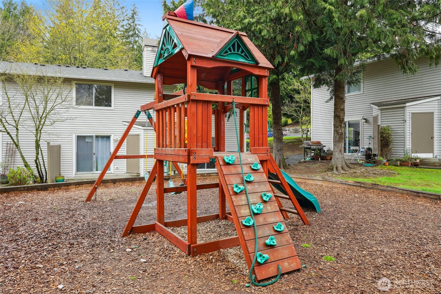 18910 Bothell Everett Highway, Unit K2 Bothell, WA 98012 - Photo 26 of 34 a front view of house with a yard
