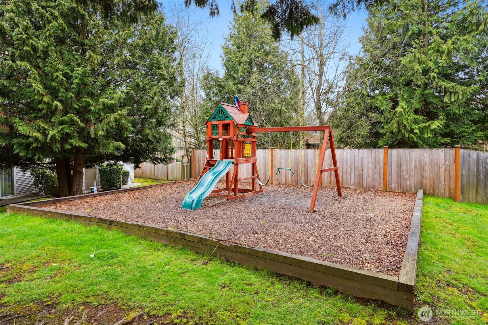 18910 Bothell Everett Highway, Unit K2 Bothell, WA 98012 - Photo 27 of 34 a view of outdoor space with playground and green space