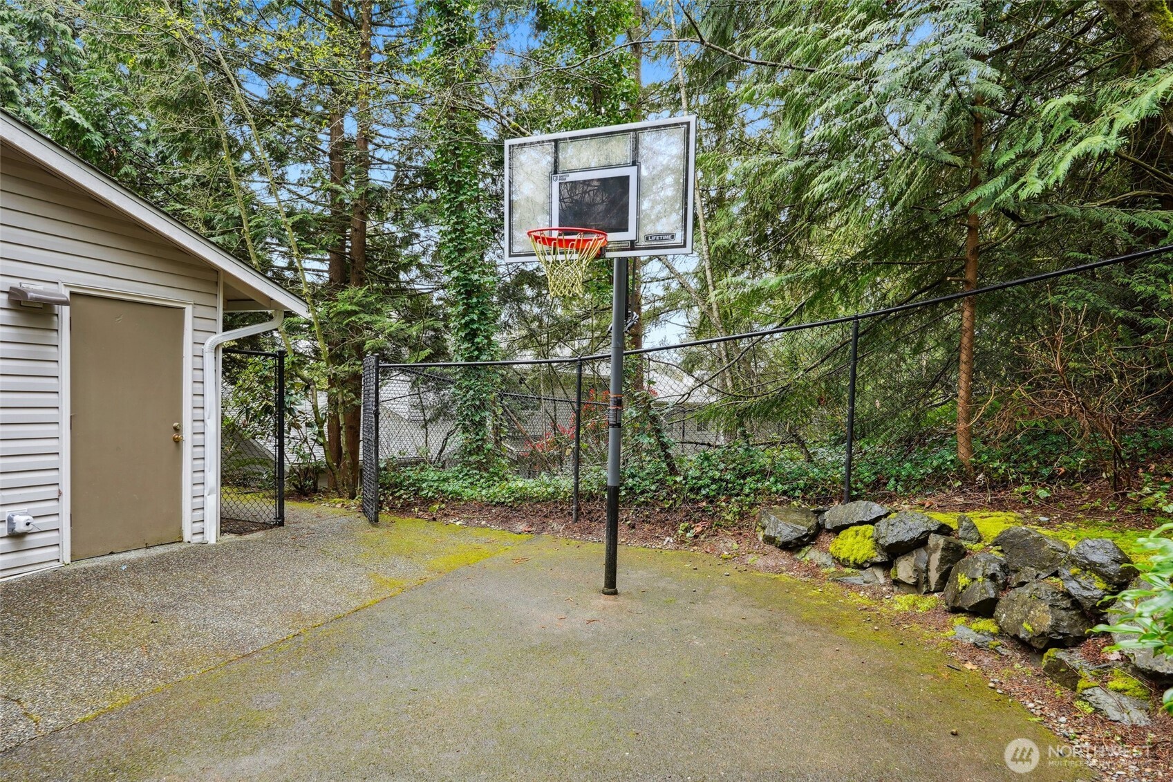 18910 Bothell Everett Highway, Unit K2 Bothell, WA 98012 - Photo 28 of 34 a view of a house with a tree