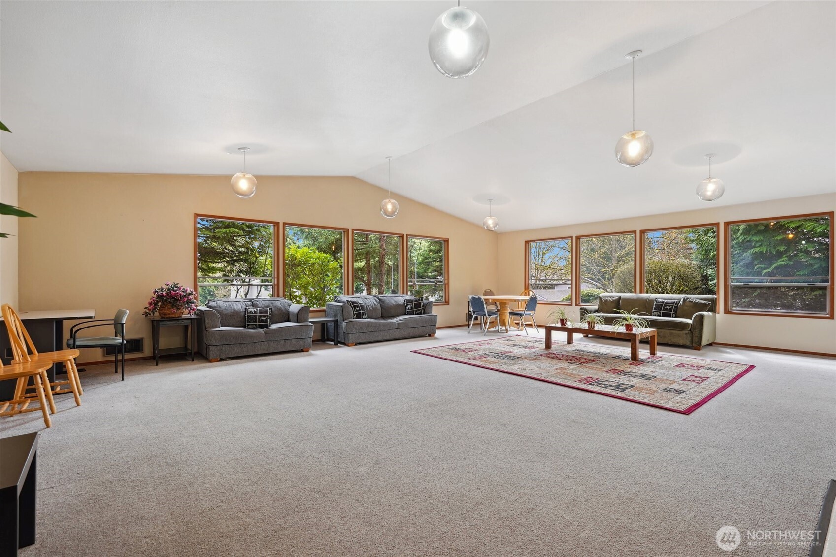 18910 Bothell Everett Highway, Unit K2 Bothell, WA 98012 - Photo 32 of 34 a living room with furniture and a large window